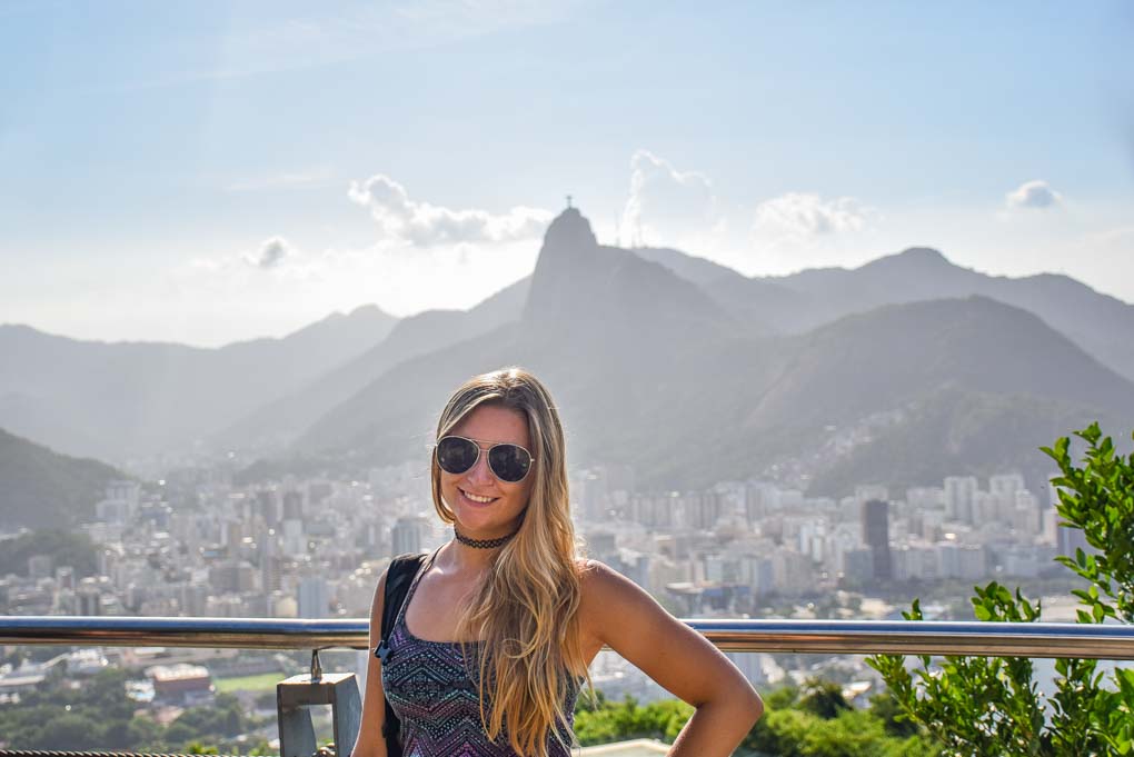Bailey stands on Sugar Loaf Mountain in Rio de Janeiro, Brazil