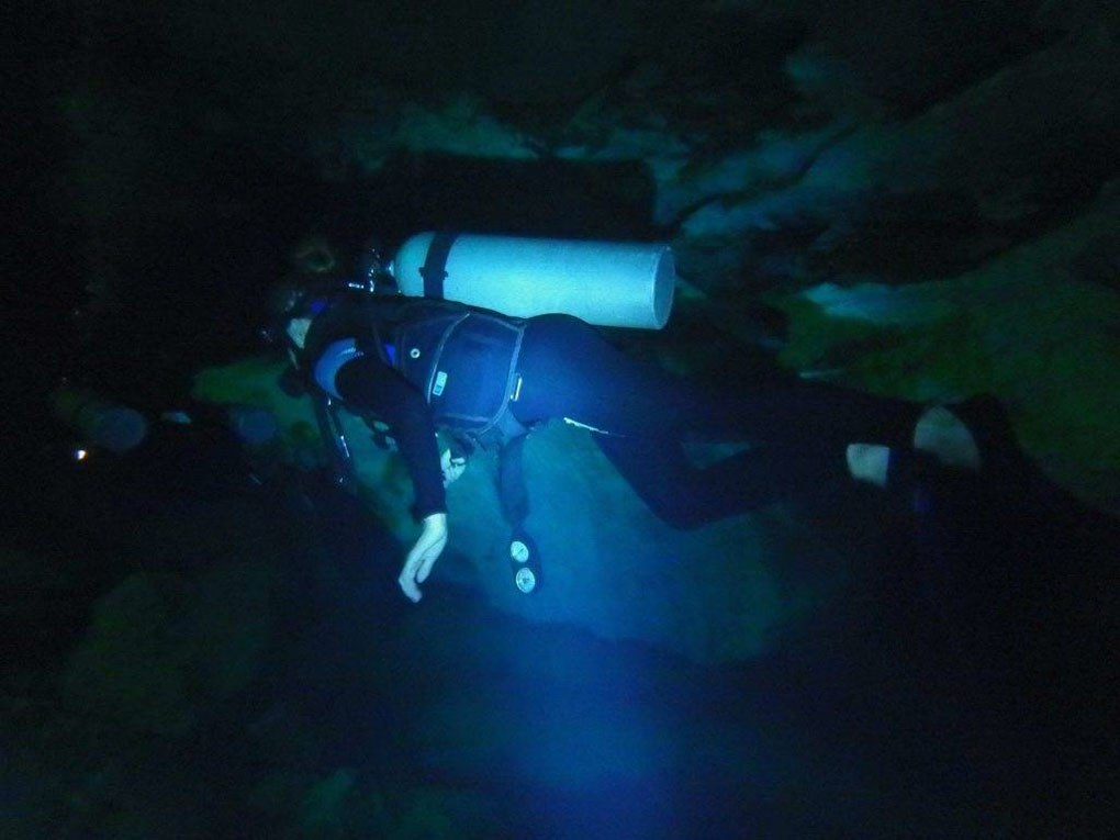 Diving in a cenote in Tulum