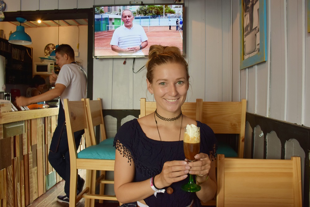 Enjoying a fancy coffee in one of the cute coffee shops in town