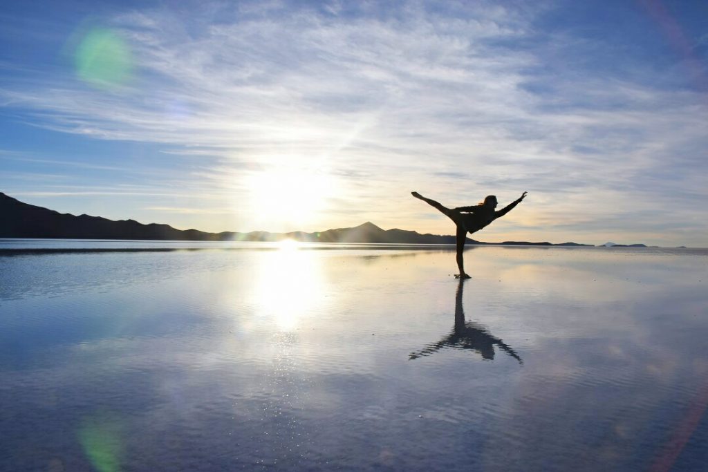 dancing photo on the Bolivia salt flats