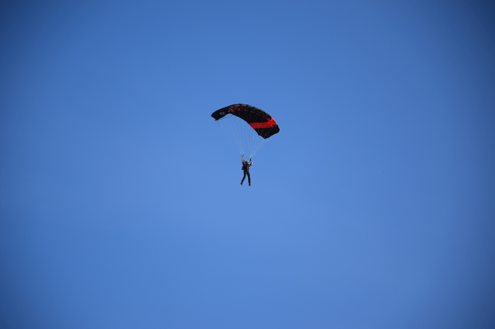 Daniel Skydiving with his parachute open