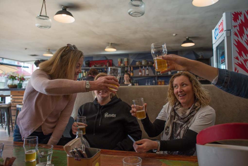 Peaple cheers on a Queenstown craft beer tour