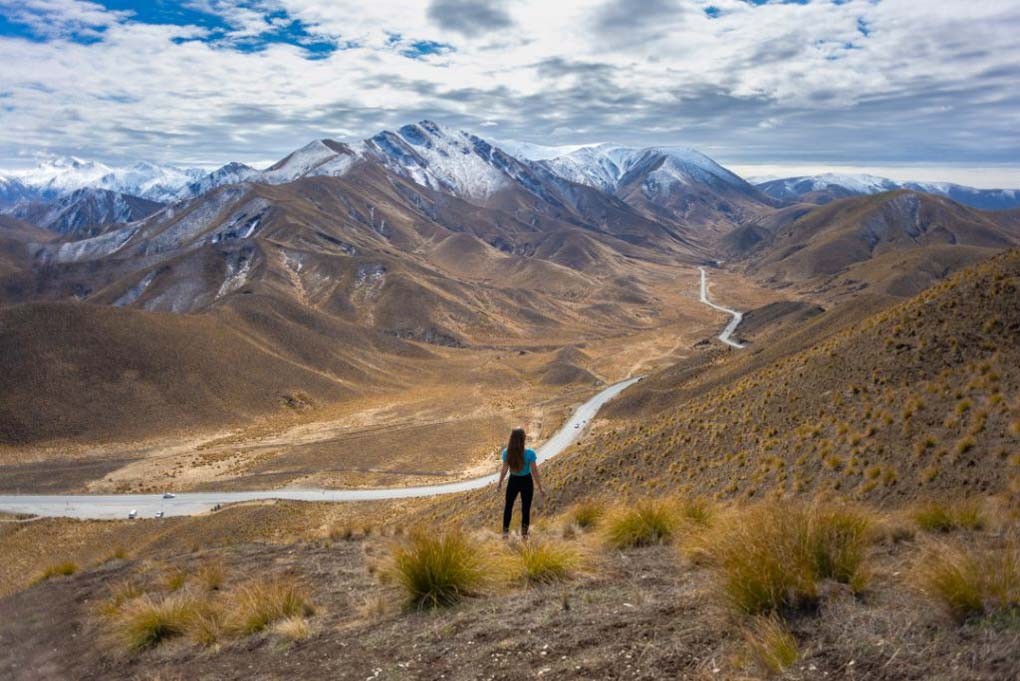 Bailey standing at the top of Lindis Pass New Zealand 