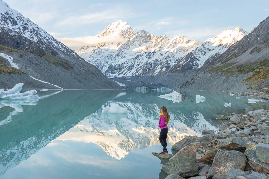 Bailey watching the sunset behind Mount Cook and the Hooker Lake, New Zealand