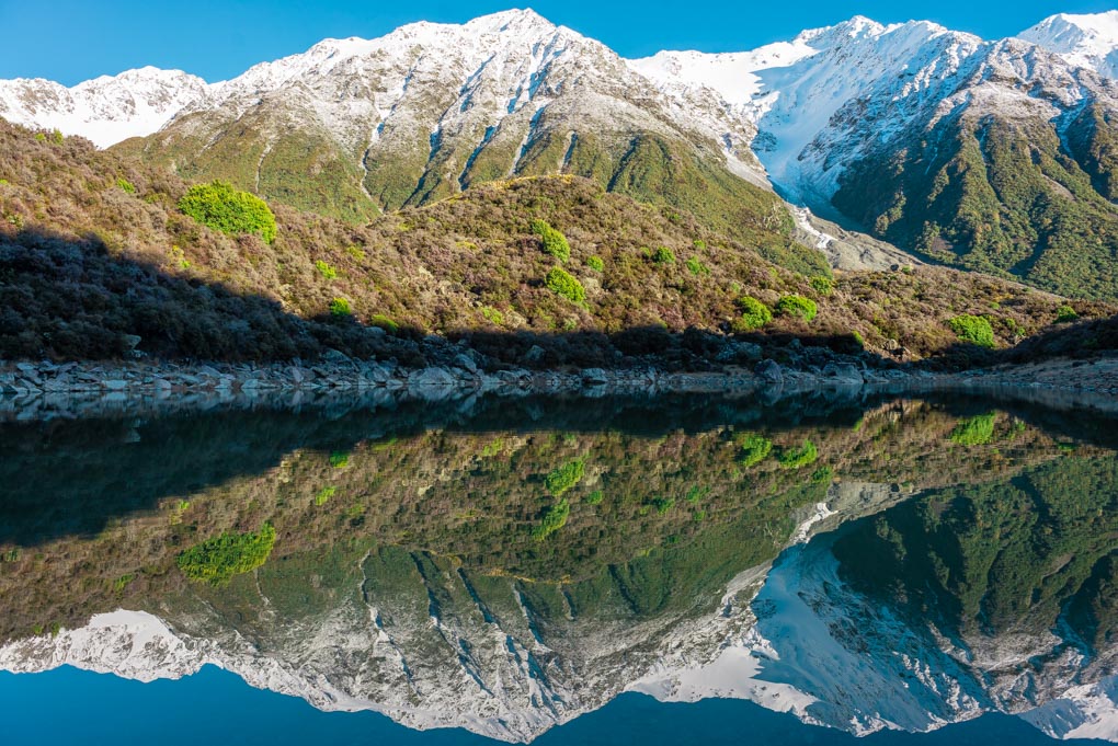 A reflection at the Blue Lakes near the Tasman Glacier and Tasman Lake