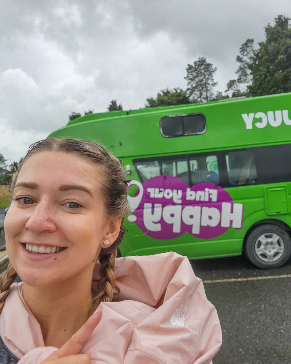 Bailey takes a selfie with a JUCY campervan
