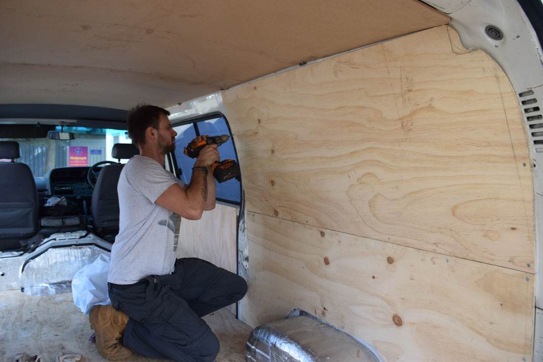 installing the walls in the van