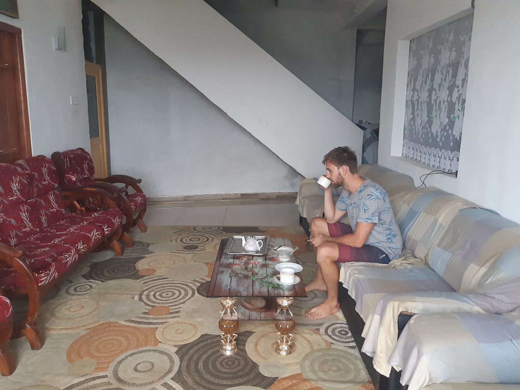 danile drinking tea at our guesthouse in haputale sri lanka