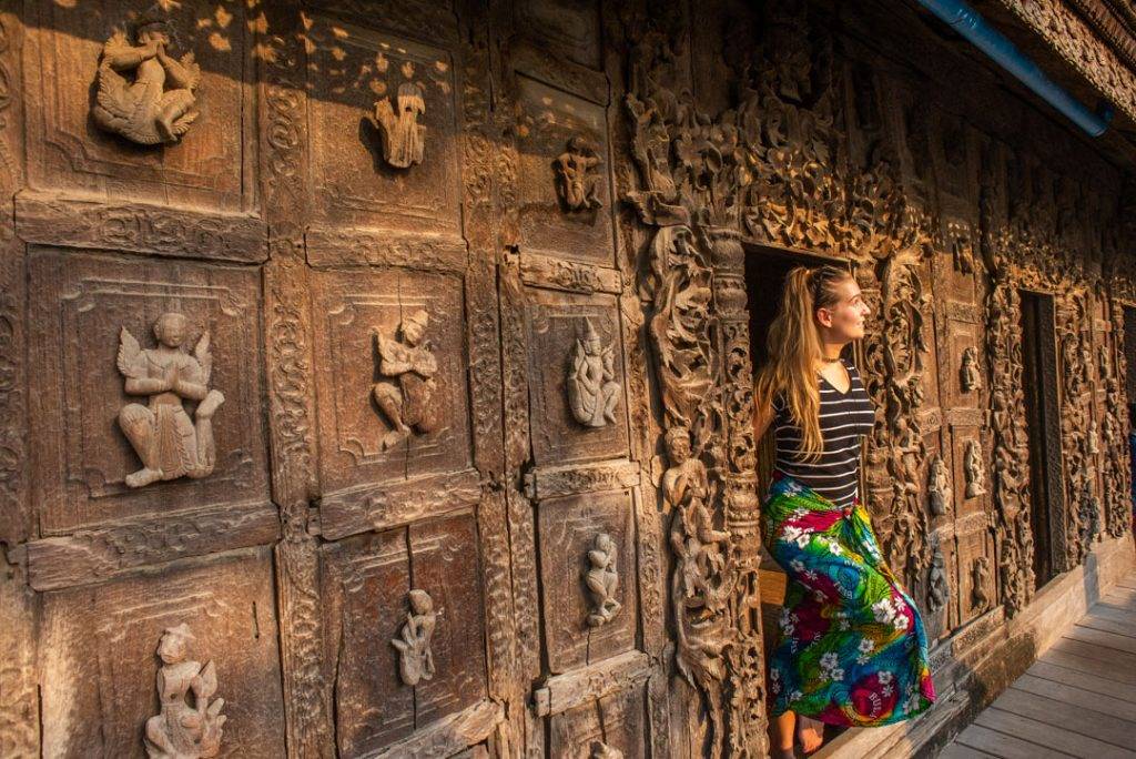 exploring the wooden temple in Mandalay