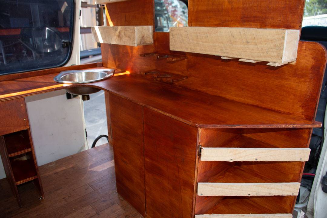 staining the kitchen in our van conversion