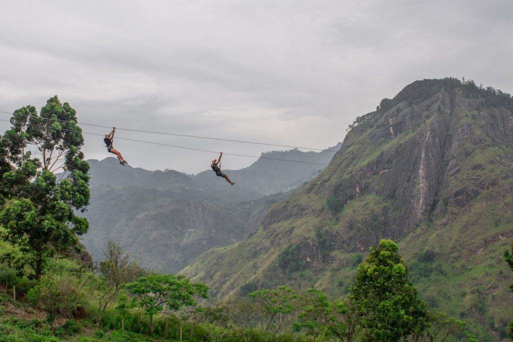 2 people riding on the Ravana Zipline