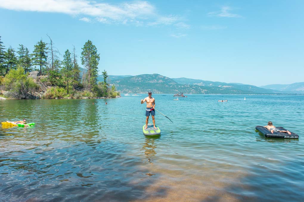 Daniel paddle boarding at Ellison Provincial Park, Vernon