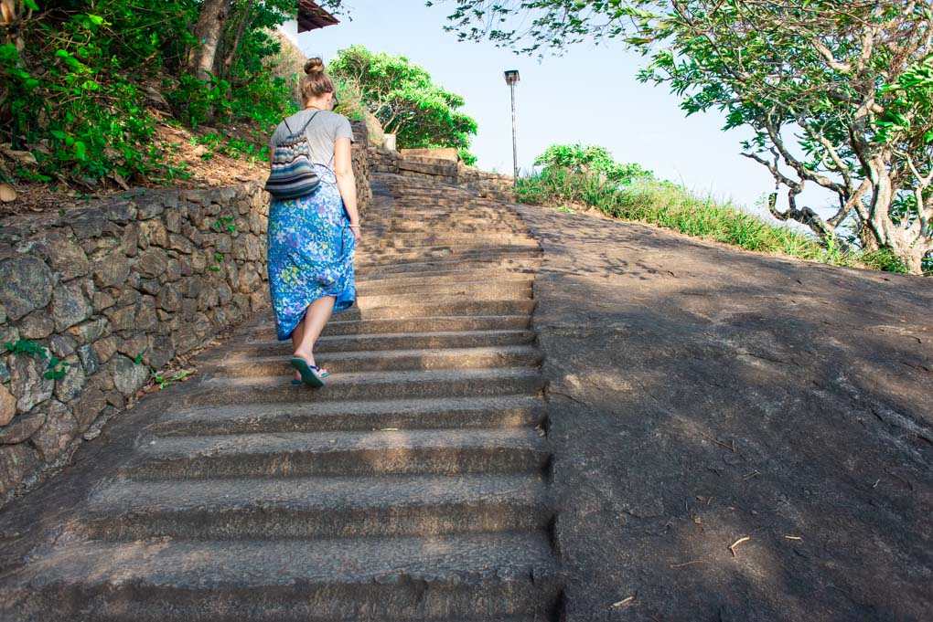 walking up the stairs to the Dambulla Cave Temples