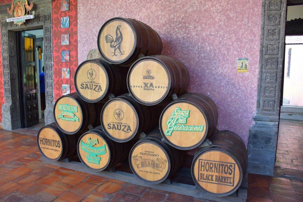barrels of tequila on a distillery tour in the town of Tequila