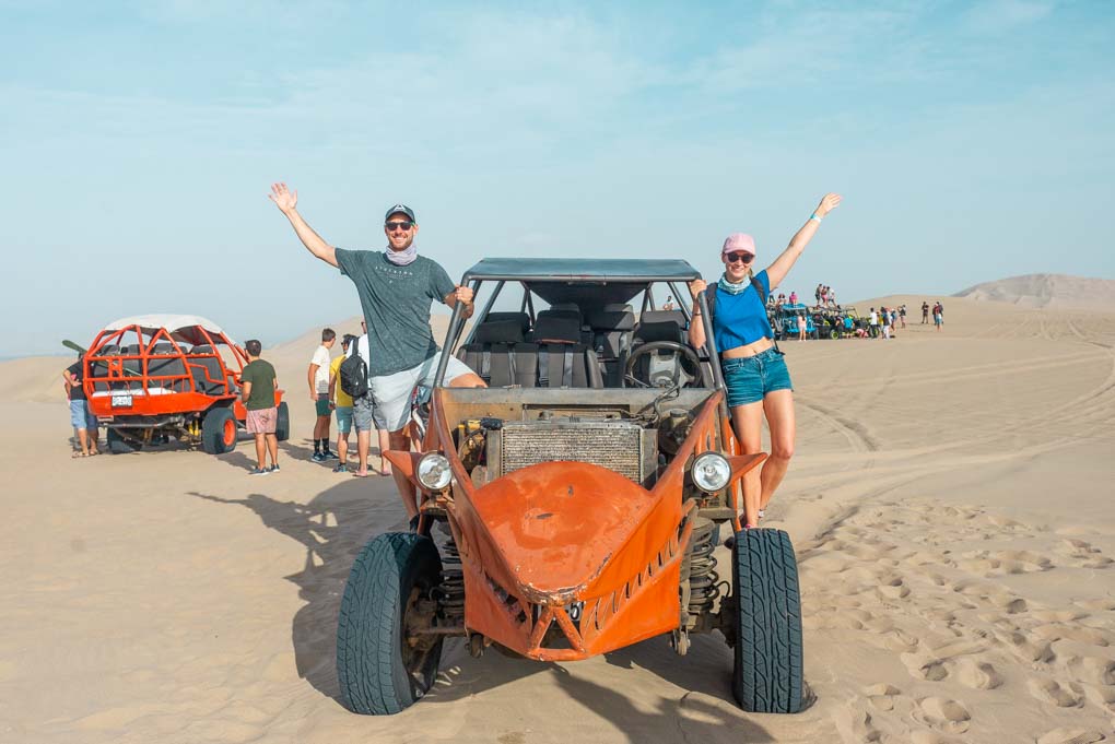 Bailey and I hang out of our dune buggy in Huaccahina