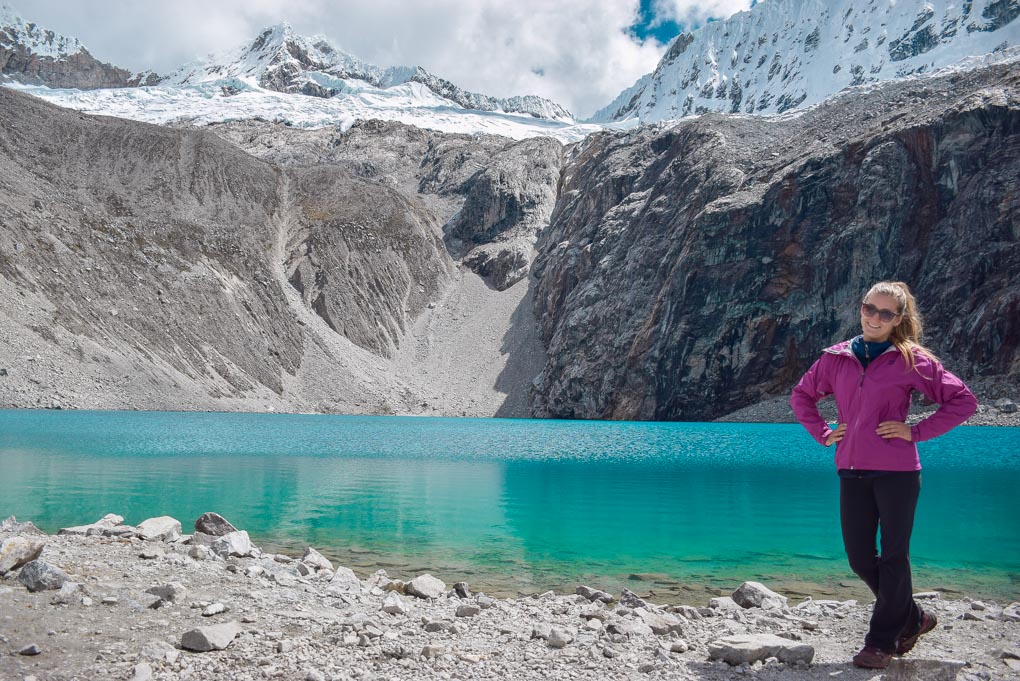 Bailey takes a photo at Laguna 69 in Peru