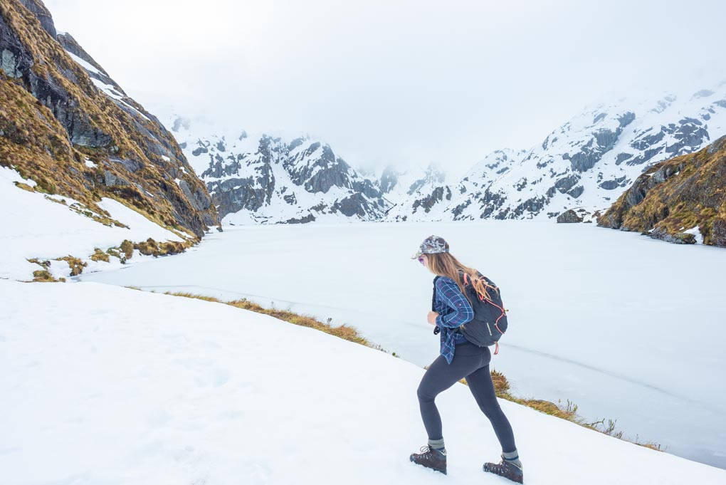 Hiking the Routeburn Track near Lake Harris in winter