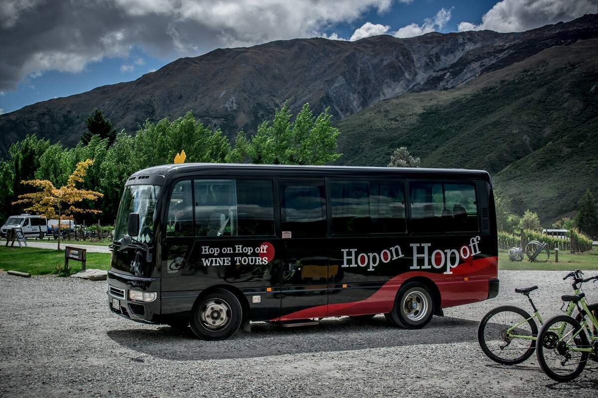 outside of the hop-on hop-off bus in Queenstown