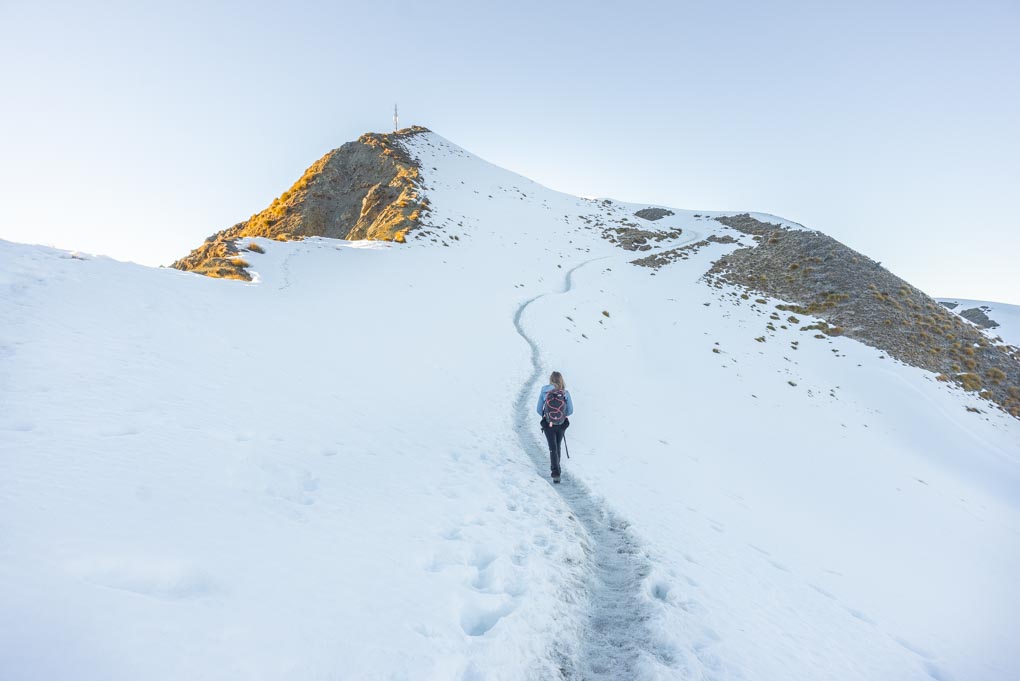 hiking to the summit of Roy's Peak in the snow