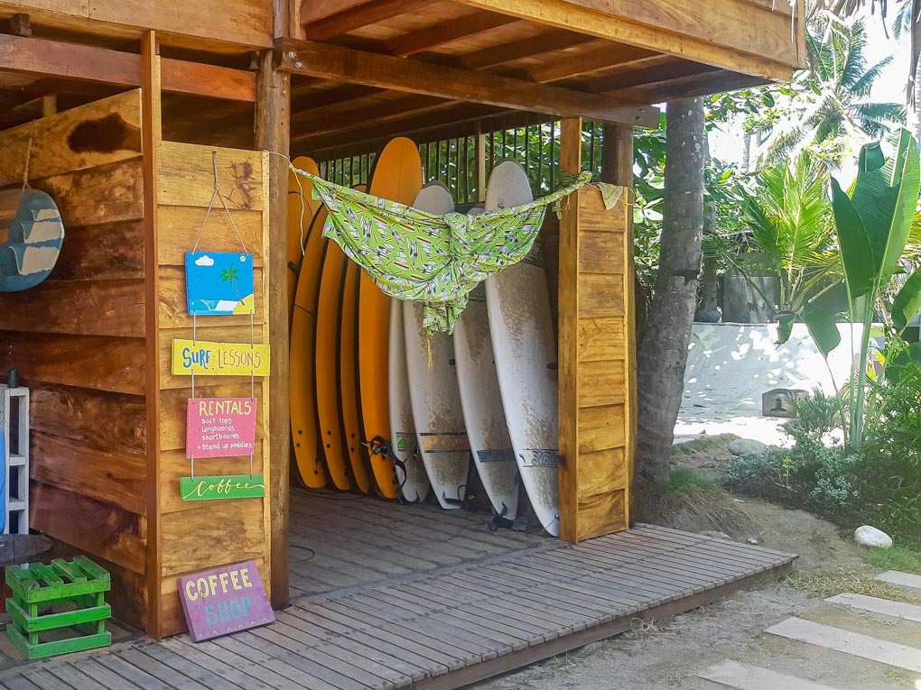 Surf boards at the surf school at Costeño Beach Hostel
