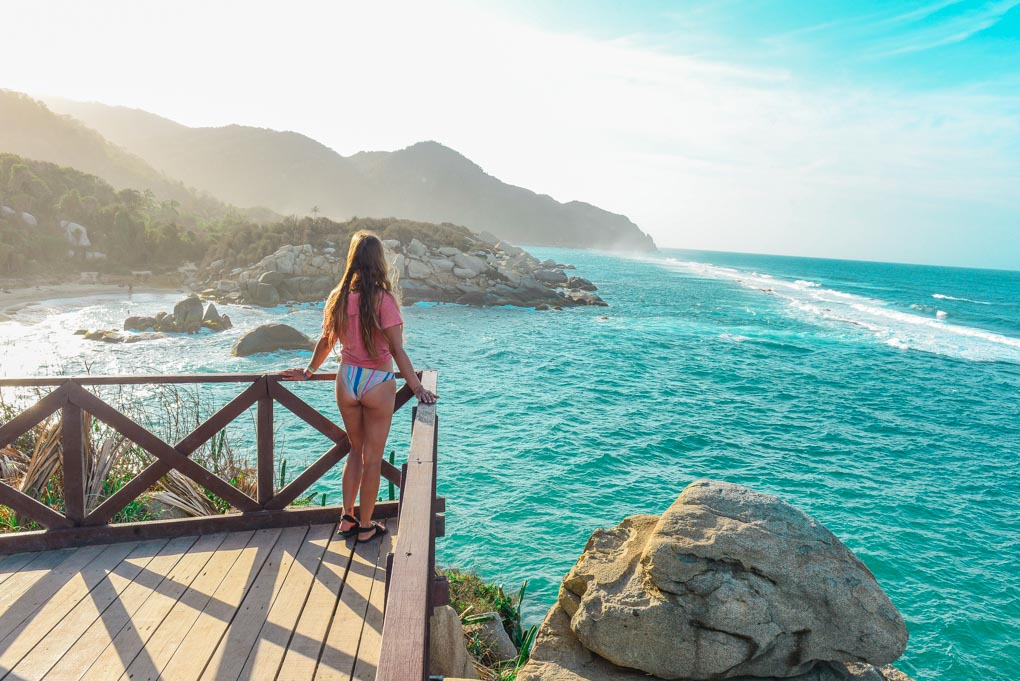 Bailey stands on the viewpoint at Caba San Juan in Tayrona National Park, Colombia