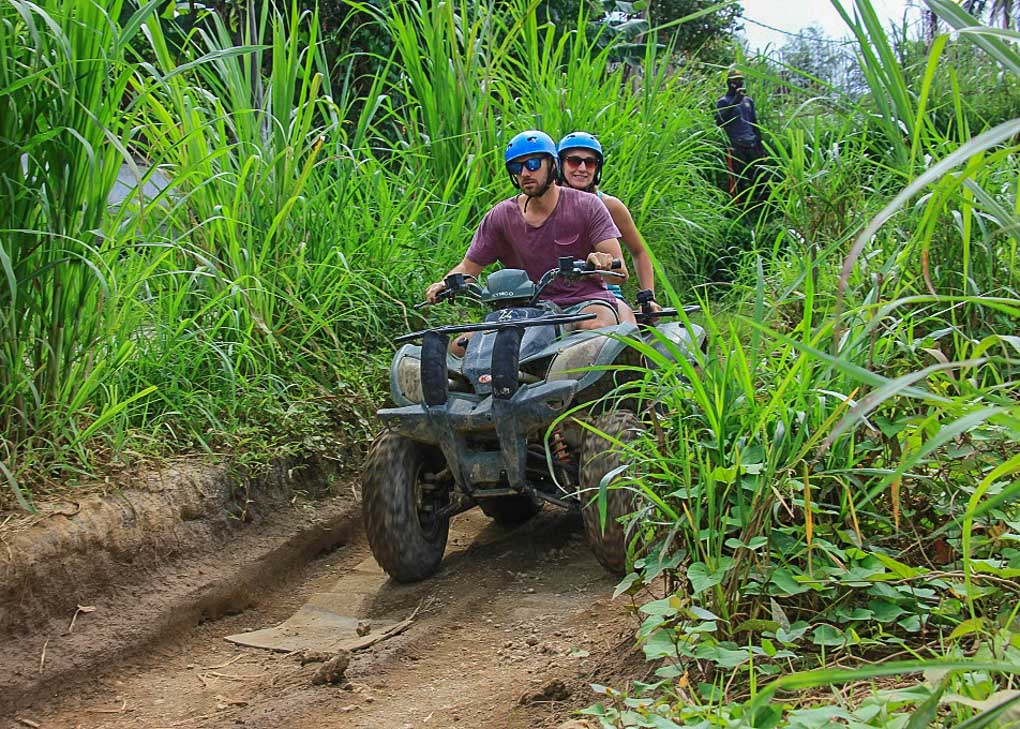 riding a quad bike on a tour in Nadi, Fiji