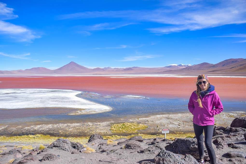 Bailey poses for a photo at a lake on our Salar de uyuni tour in Bolivia
