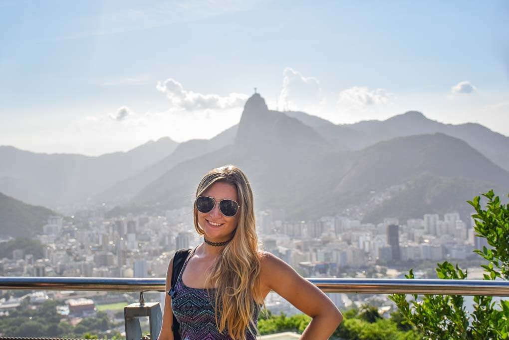 Bailey posses for a photo on a viewpoint overlooking the ciaty of Rio de Janeiro in BrazilBailey posses for a
