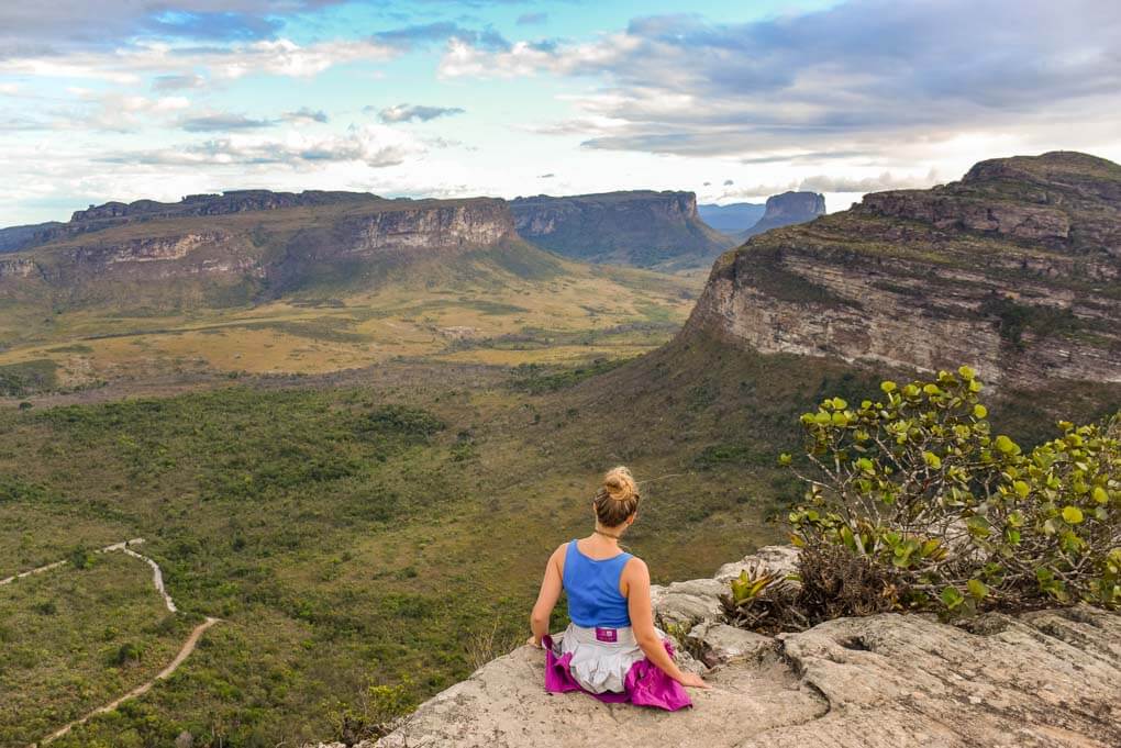 Bailey sits on a viewpoint overlooking part of Chapada Diamantina National Park in Brazil