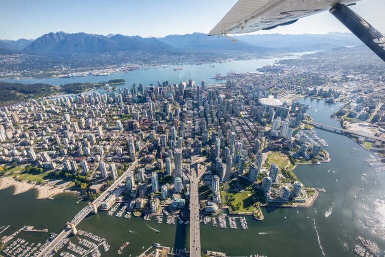 A seaplane fly's above Vancouver, Canada on a tour from Vancouver.