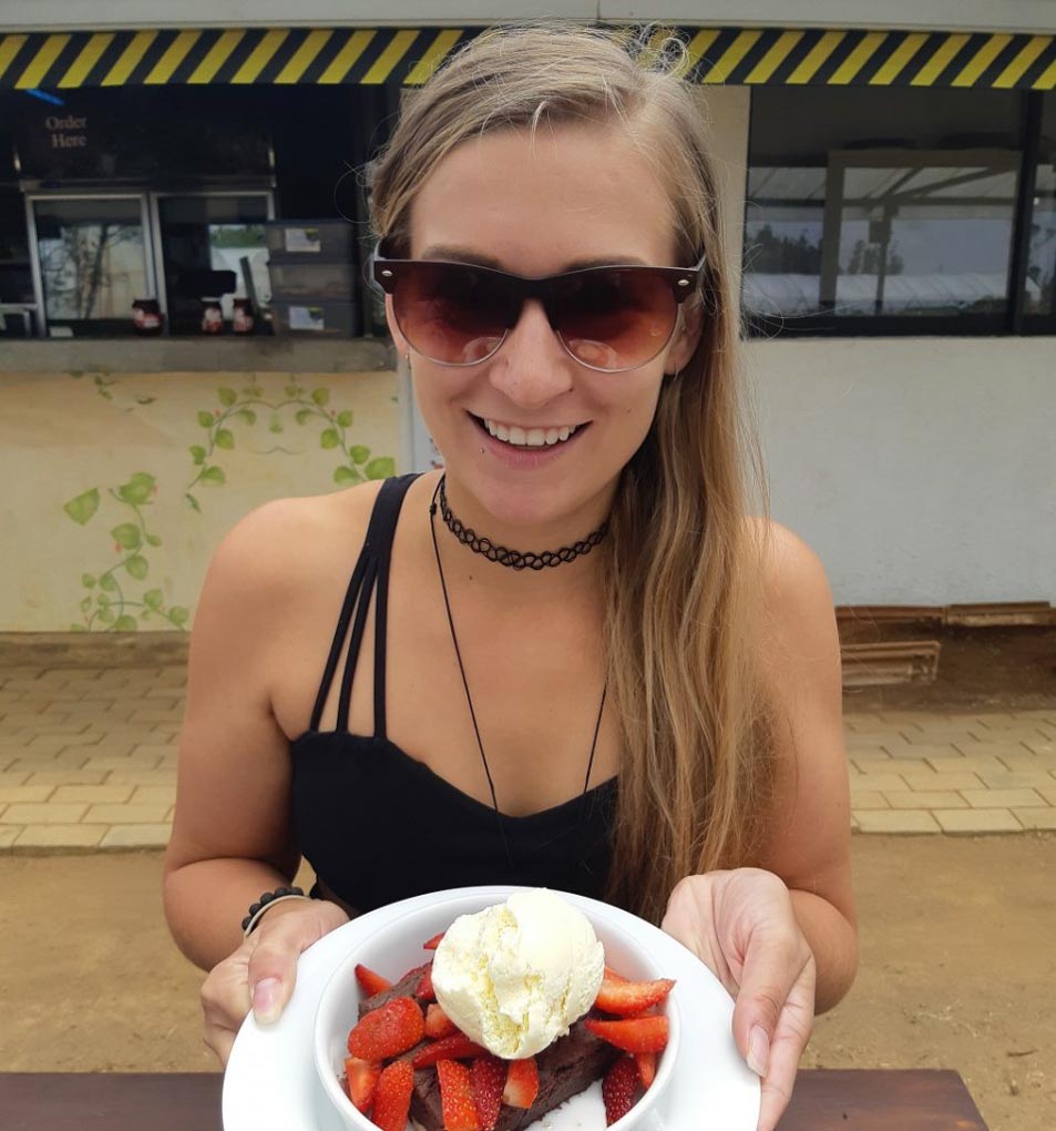 eating a strawberry dessert in Nuwara Eliya, Sri Lanka