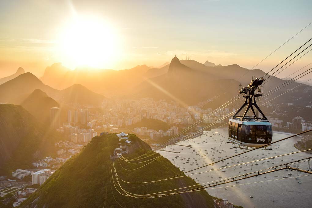A sunset view from Sugar Loaf Mountain with the gondola in view