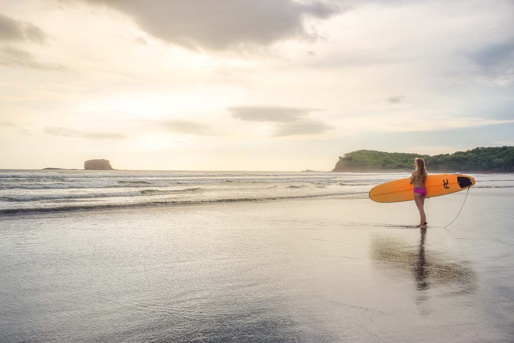 A surfer at Playa Hermosa, Nicaragua
