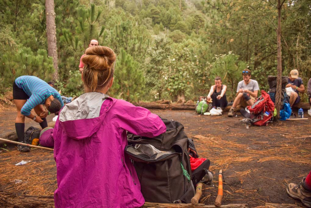group stopped for a rest break along the Acatenango Volcano trail in Guatemala