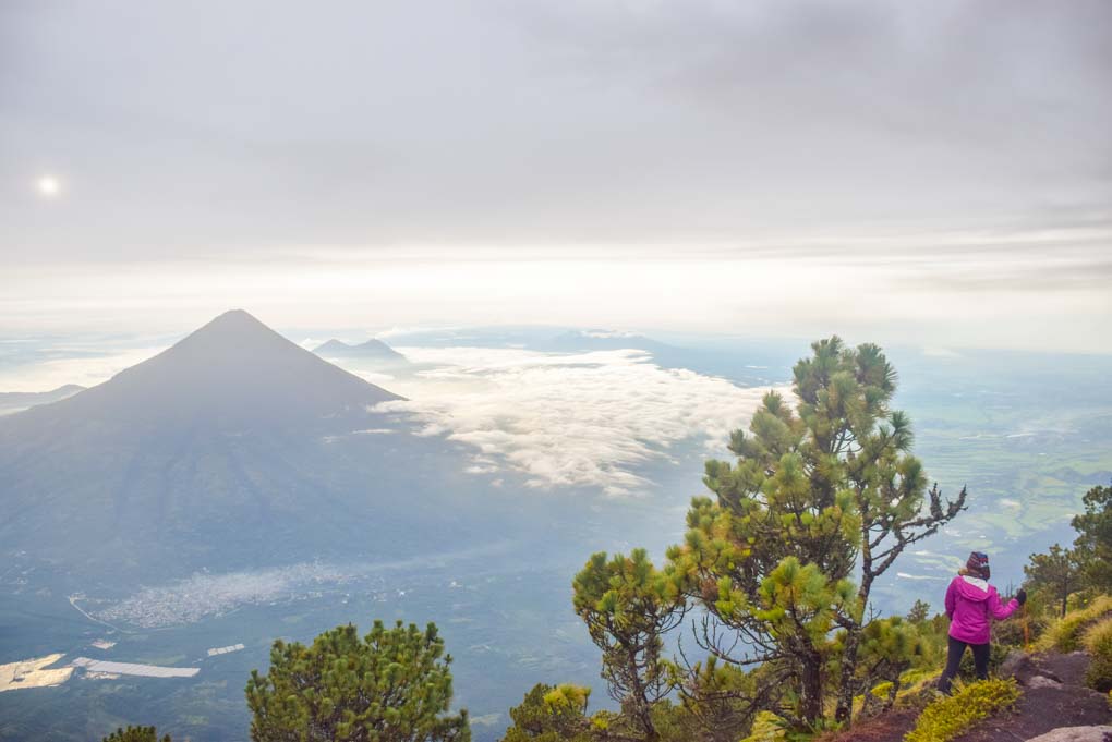 view of Fuego Volcano from above the clouds