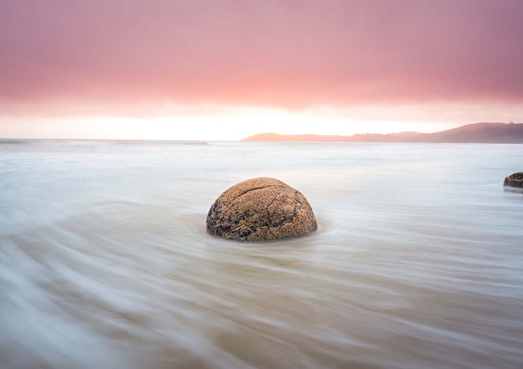 slow shutter shot of the Moeraki Boulders, New Zealand