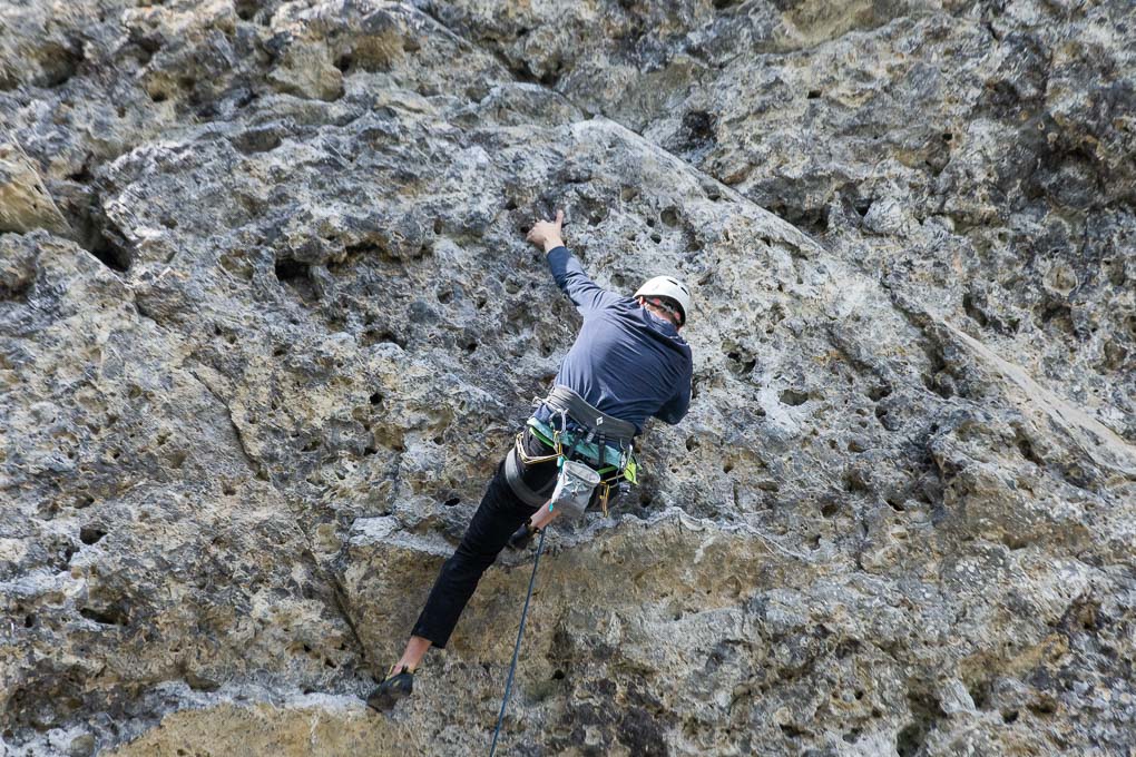 A man rock climbs in Canada
