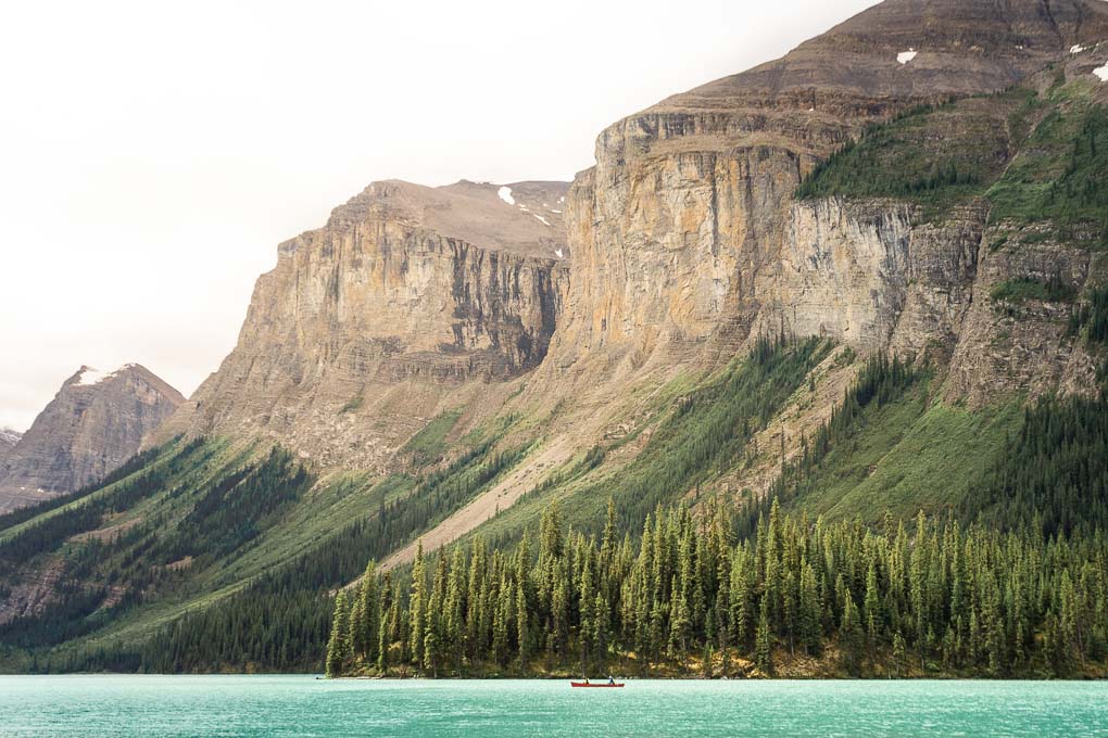 A couple canoe on Maligne Lake in Jasper National Park