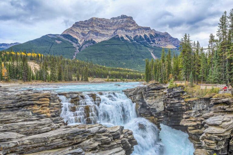 Athabasca Falls with a huge mountain in the background in Jasper national Park
