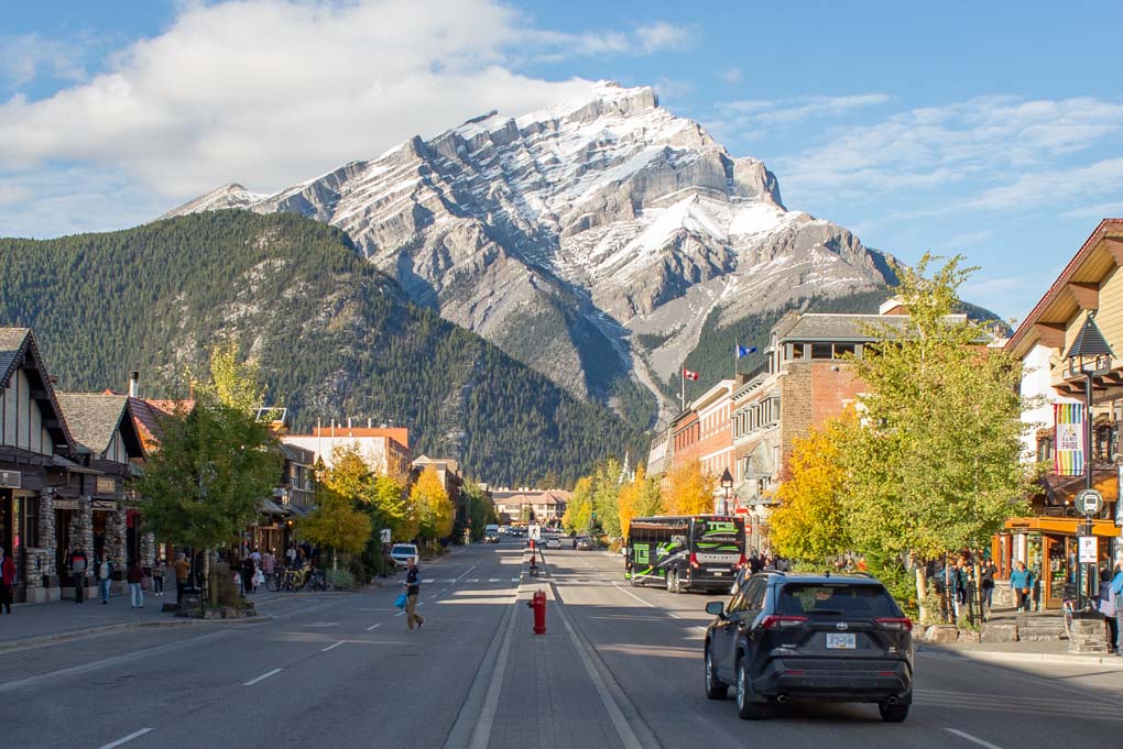 Photo of Banff Ave in Banff Town howing how beautiful the street is wioth the surounding mountains