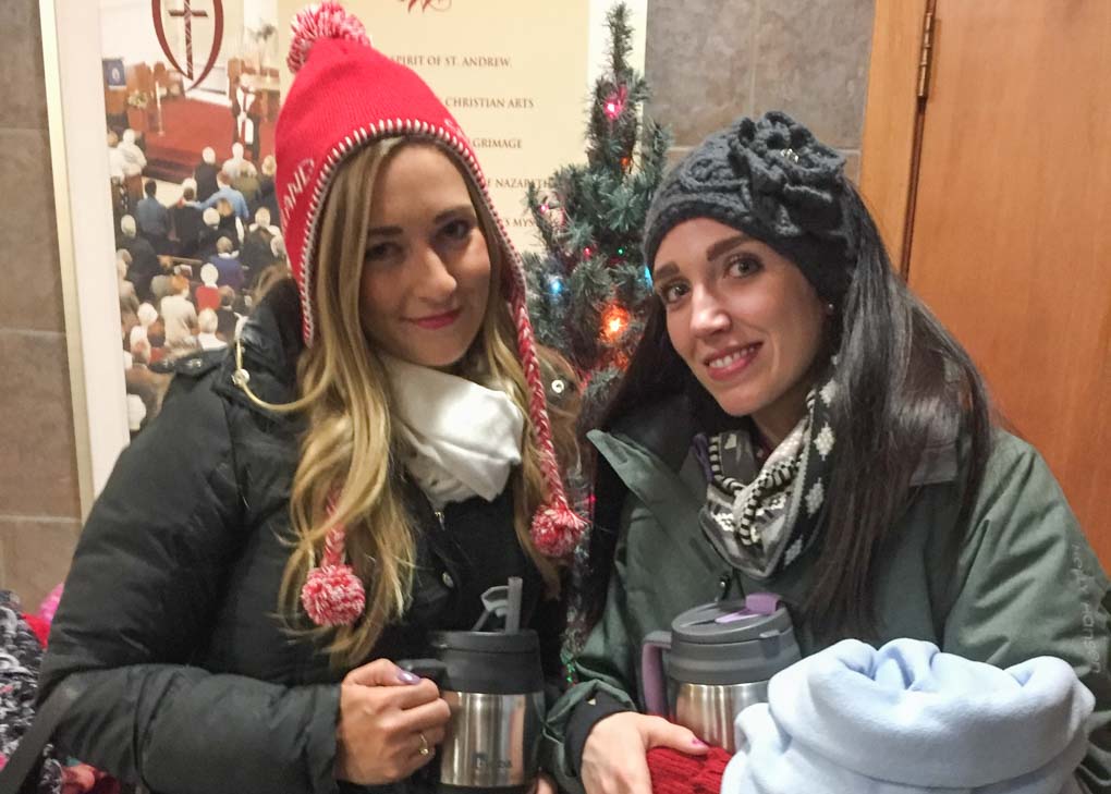 posing with a Christmas tree in Banff, Alberta, Canada
