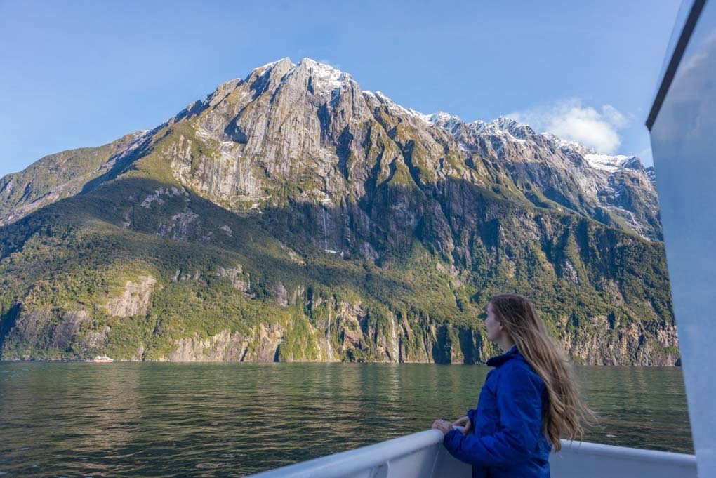 girl on a milford sound cruise in new zealand
