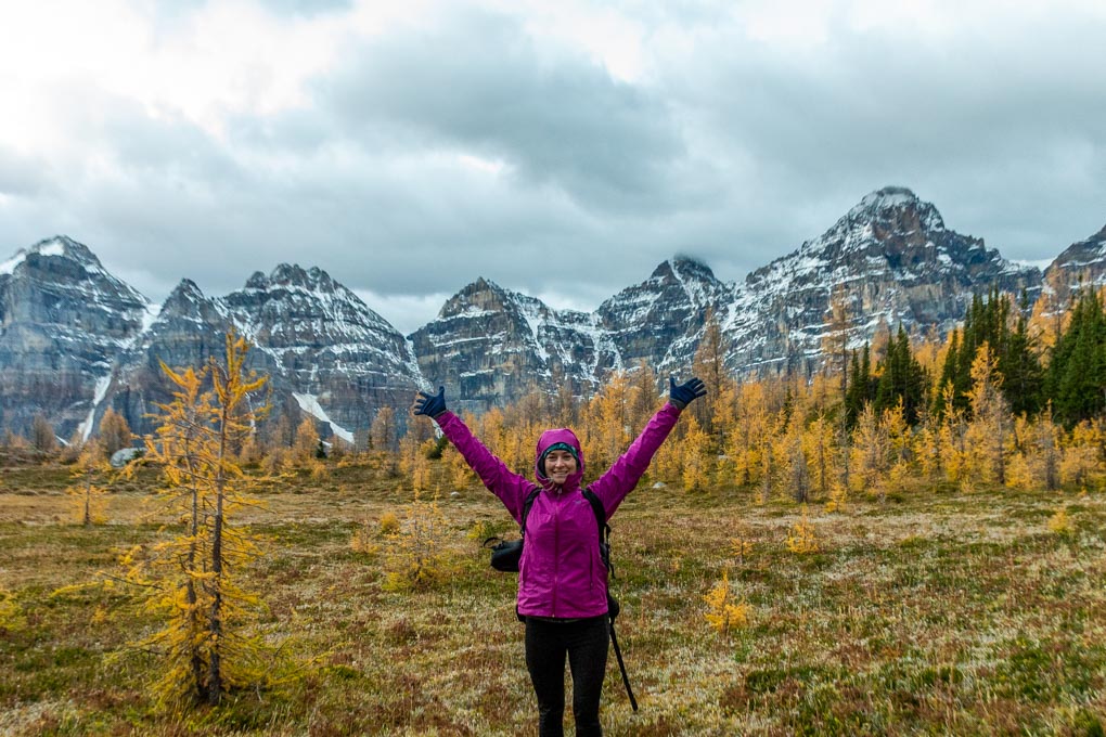 A lady in all her hiking gear on the Larch Valley Trail