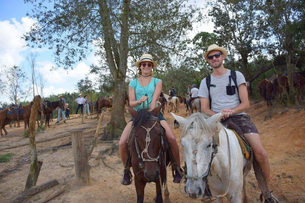 two people riding horses in the Valley of Vianles