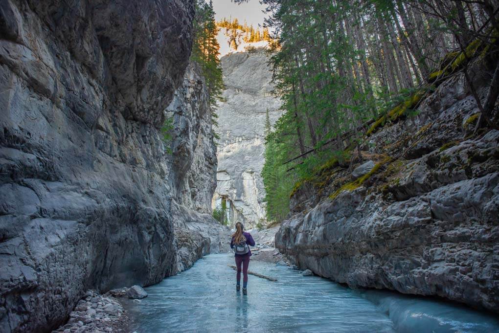 A lady walks through the Grotto Canyon in winter
