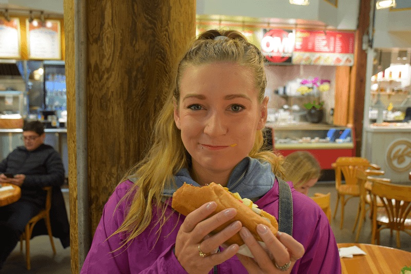 eating a hot dog at the Granville Public Market