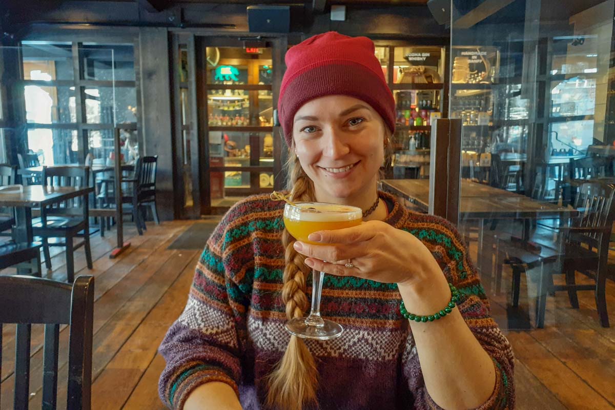 Bailey drinks a cocktail Park Distillery Restaurant and Bar