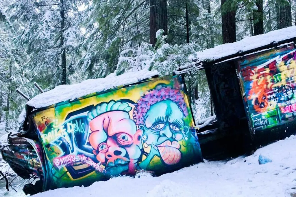 A train sits in the snow on the Train Wreck Trail, Whistler