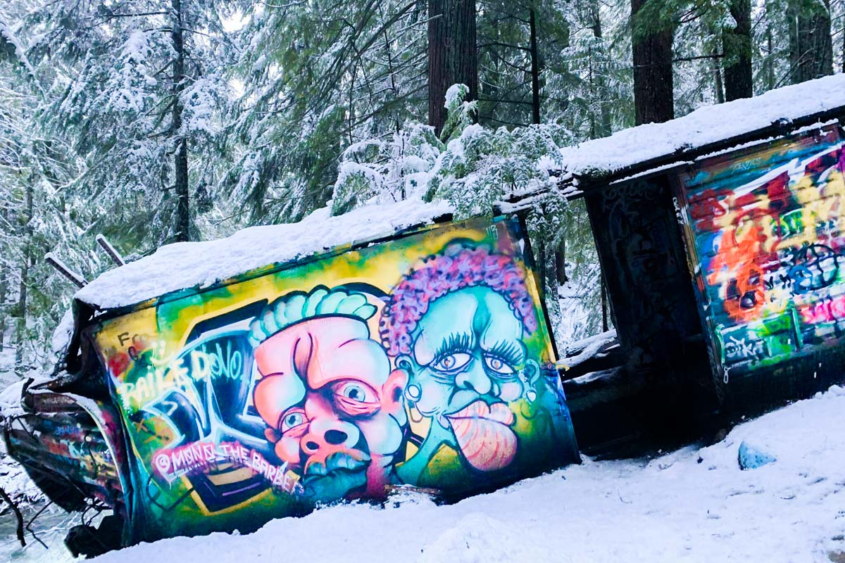 A train sits in the snow on the Train Wreck Trail, Whistler