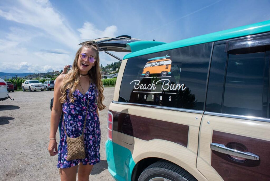 Bailey with our tour guides vehicle on Kelowna
